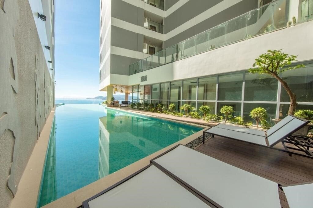 Фото Handy Panorama Nha Trang Condotel 3*